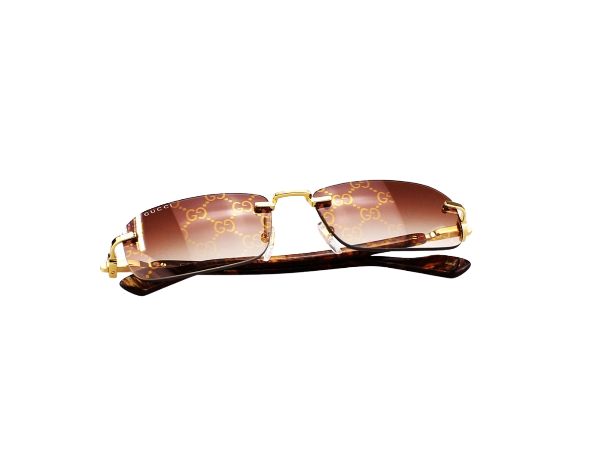 https://d2cva83hdk3bwc.cloudfront.net/gucci-gg1221s-004-56-sunglasses-in-gold-metal-havana-acetate-frame-with-guccisima-brown-gradient-lenses-6.jpg