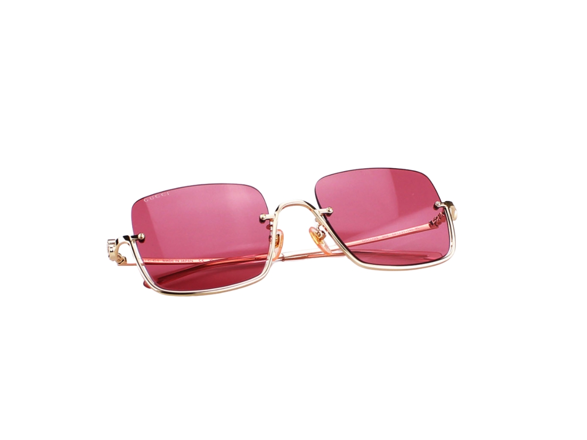 https://d2cva83hdk3bwc.cloudfront.net/gucci-gg1279s-003-54-sunglasses-in-gold-metal-frame-with-red-lenses-6.jpg