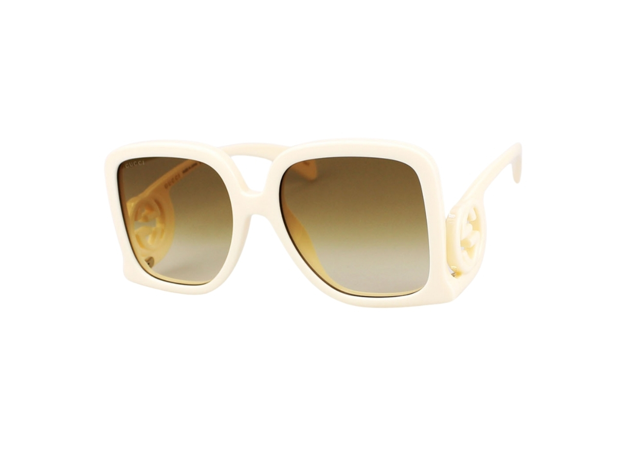 https://d2cva83hdk3bwc.cloudfront.net/gucci-gg1326s-002-58-sunglasses-in-ivory-acetate-frame-interlocking-g-with-green-tea-lenses-1.jpg