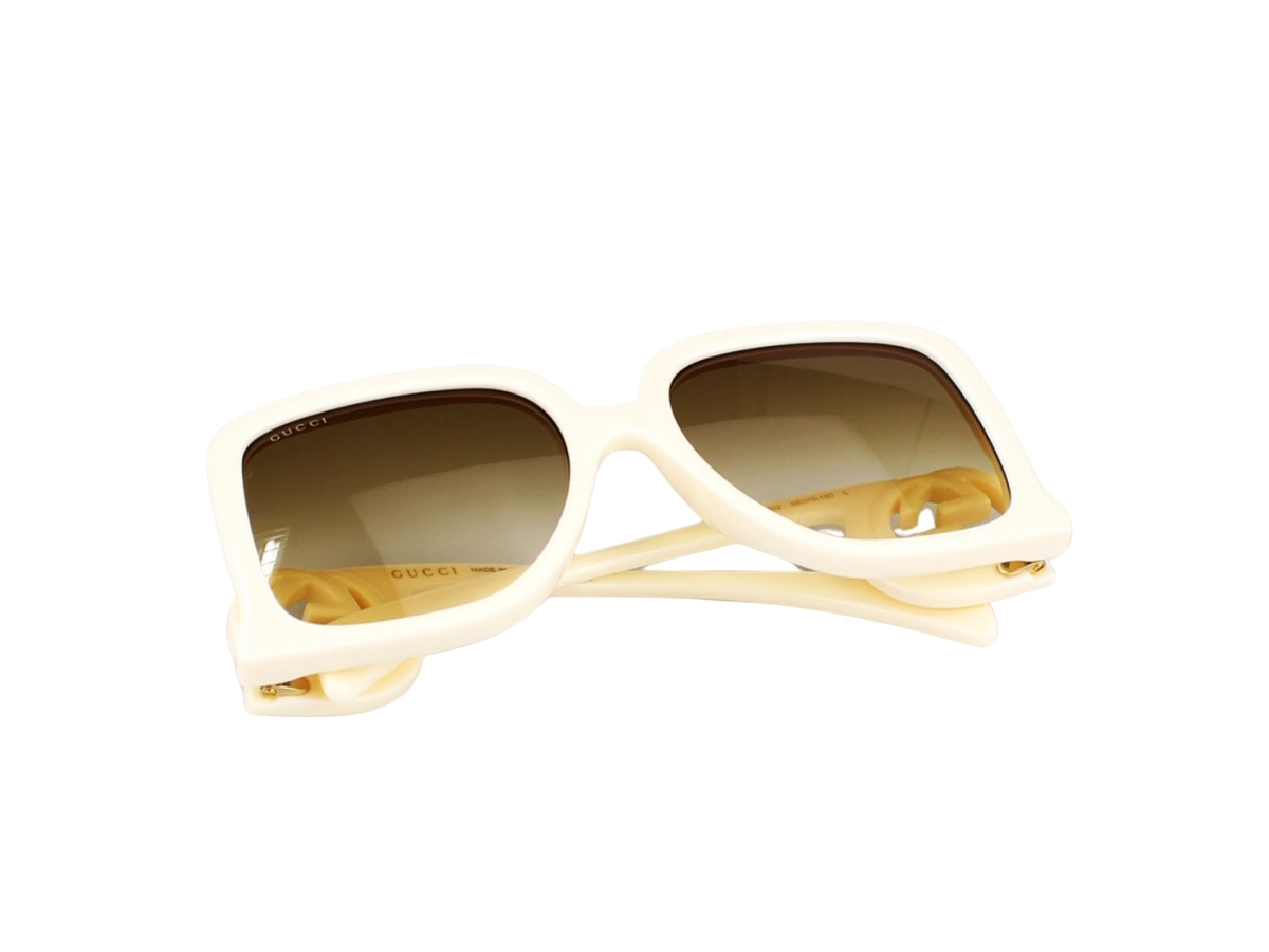 https://d2cva83hdk3bwc.cloudfront.net/gucci-gg1326s-002-58-sunglasses-in-ivory-acetate-frame-interlocking-g-with-green-tea-lenses-6.jpg