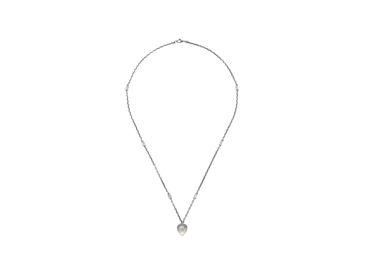 https://d2cva83hdk3bwc.cloudfront.net/gucci-heart-necklace-with-interlocking-g-in-sterling-silver-with-red-enamel-2.jpg