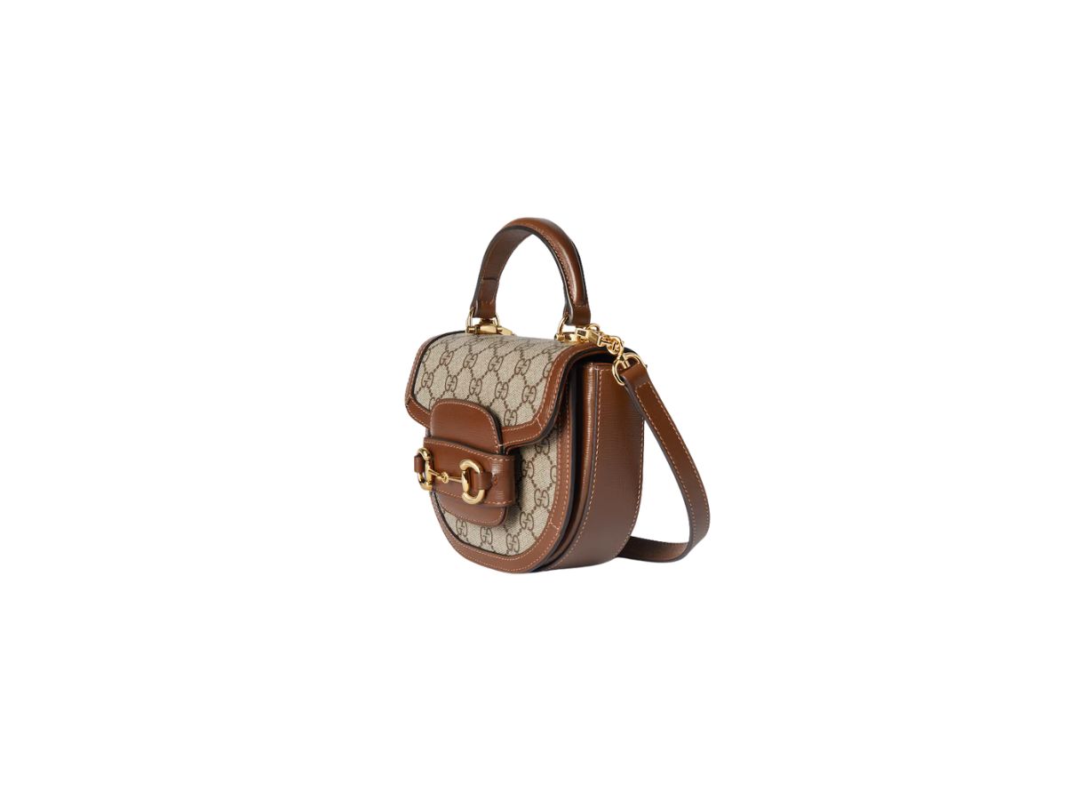 https://d2cva83hdk3bwc.cloudfront.net/gucci-horsebit-1955-mini-top-handle-bag-in-beige-and-ebony-gg-supreme-canvas-with-light-gold-toned-hardware-2.jpg