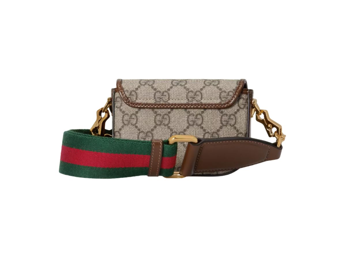 https://d2cva83hdk3bwc.cloudfront.net/gucci-horsebit-1955-strap-wallet-gg-supreme-canvas-beige-and-ebony-2.jpg