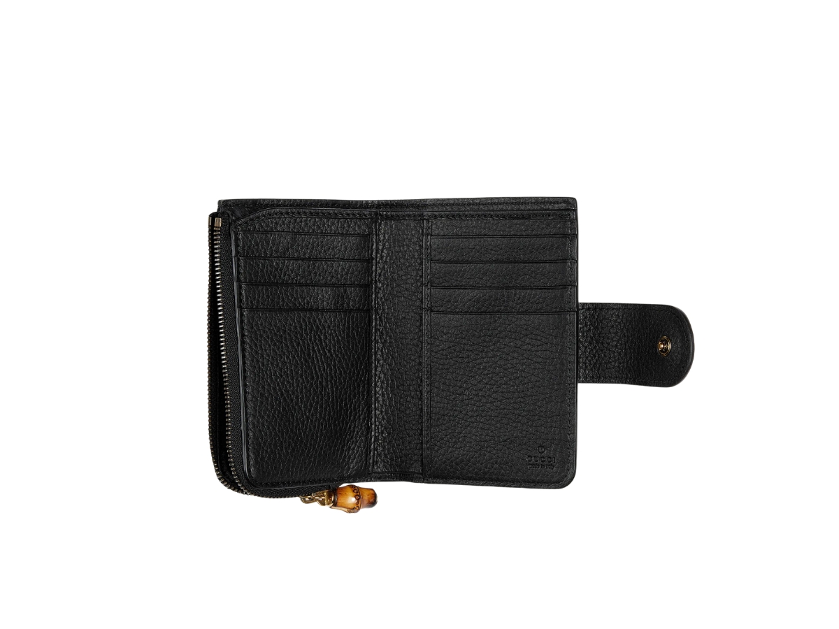 https://d2cva83hdk3bwc.cloudfront.net/gucci-medium-double-g-wallet-with-bamboo-in-black-leather-with-gold-toned-hardware-3.jpg