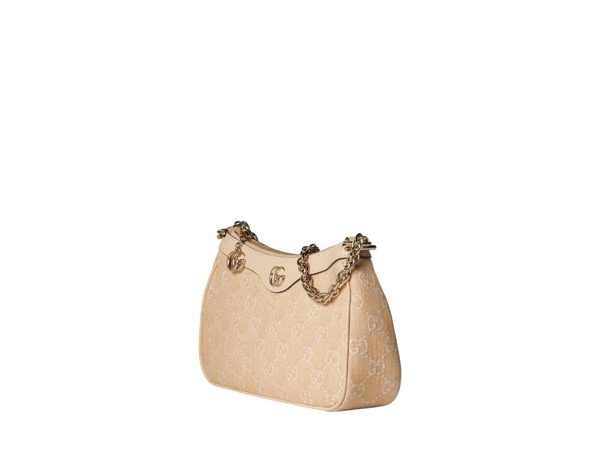 https://d2cva83hdk3bwc.cloudfront.net/gucci-ophidia-gg-small-shoulder-bag-in-light-beige-gg-denim-with-light-gold-toned-hardware-2.jpg