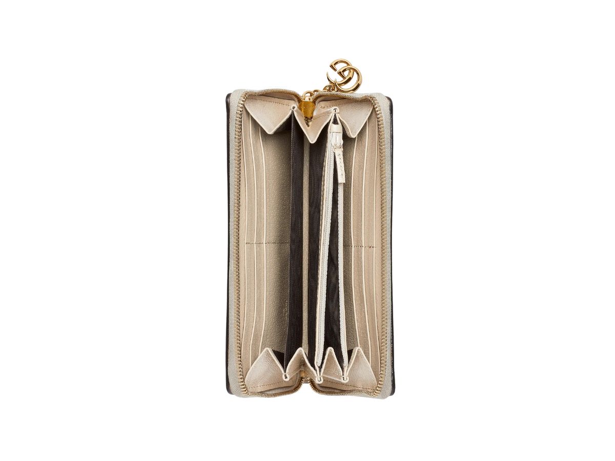 https://d2cva83hdk3bwc.cloudfront.net/gucci-ophidia-gg-zip-around-wallet-in-beige-white-gg-supreme-canvas-oatmeal-trim-with-gold-toned-hardware-3.jpg