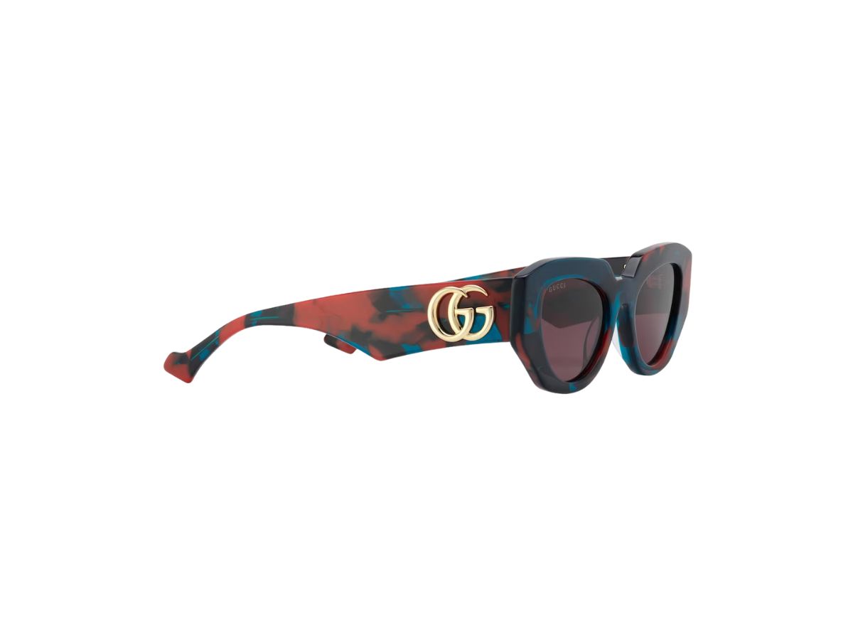 https://d2cva83hdk3bwc.cloudfront.net/gucci-red-and-blue-tortoiseshell-in-shiny-red-and-blue-tortoiseshell-acetate-frame-with-solid-purple-lens-2.jpg