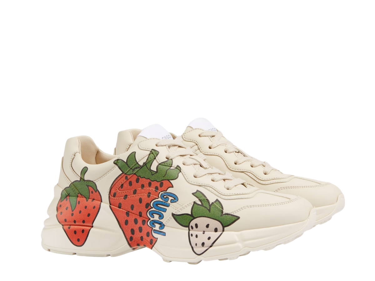 https://d2cva83hdk3bwc.cloudfront.net/gucci-rhyton-silhouette-with-a-vintage-strawberry-print-3.jpg