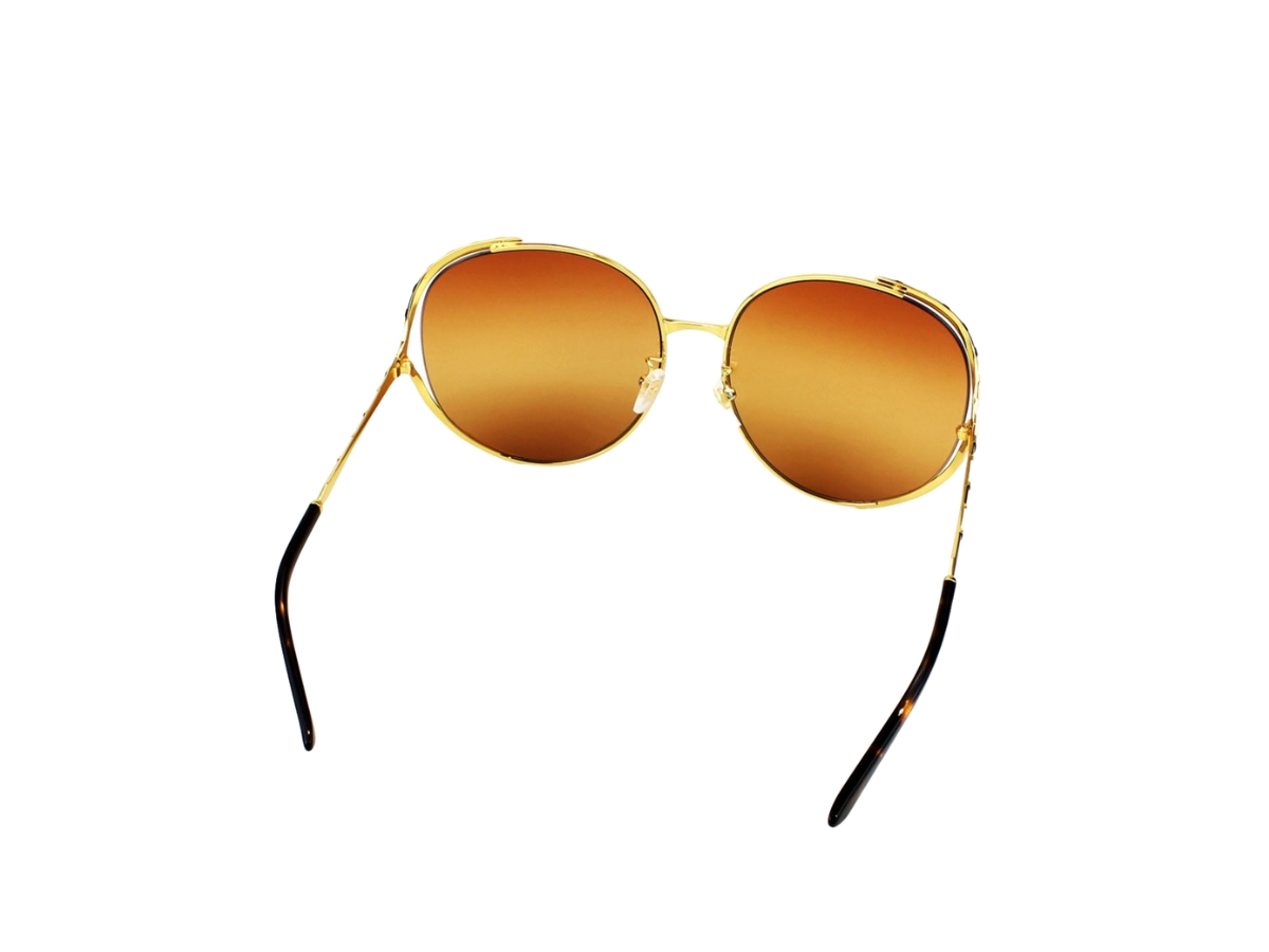 https://d2cva83hdk3bwc.cloudfront.net/gucci-round-sunglasses-in-gold-metal-plastic-with-orange-gradient-lens-4.jpg