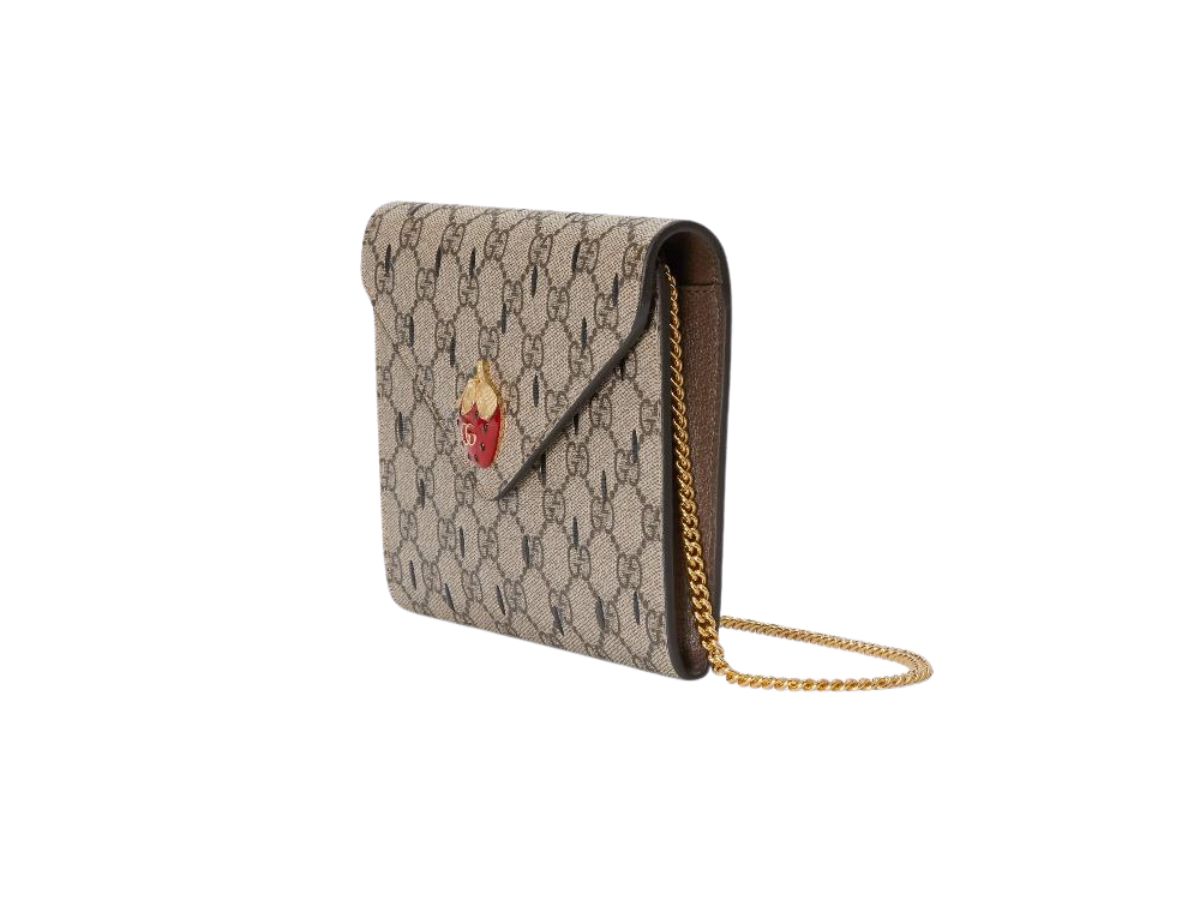 https://d2cva83hdk3bwc.cloudfront.net/gucci-strawberry-mini-bag-in-beige-and-ebony-gg-supreme-with-gold-tone-hardware-2.jpg