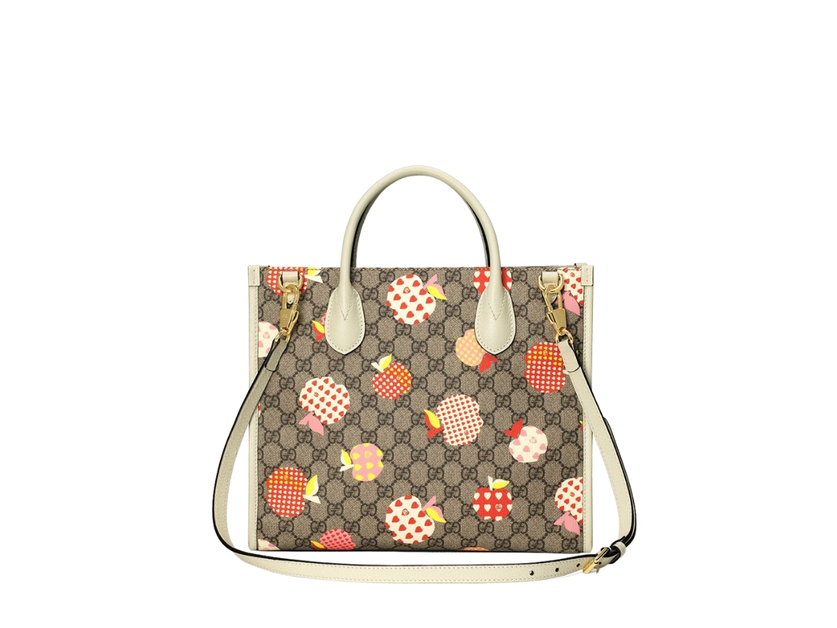 https://d2cva83hdk3bwc.cloudfront.net/gucci-tote-bag-in-supreme-canvas-and-apple-heart-print-with-gold-toned-hardware-neutrals-2.jpg