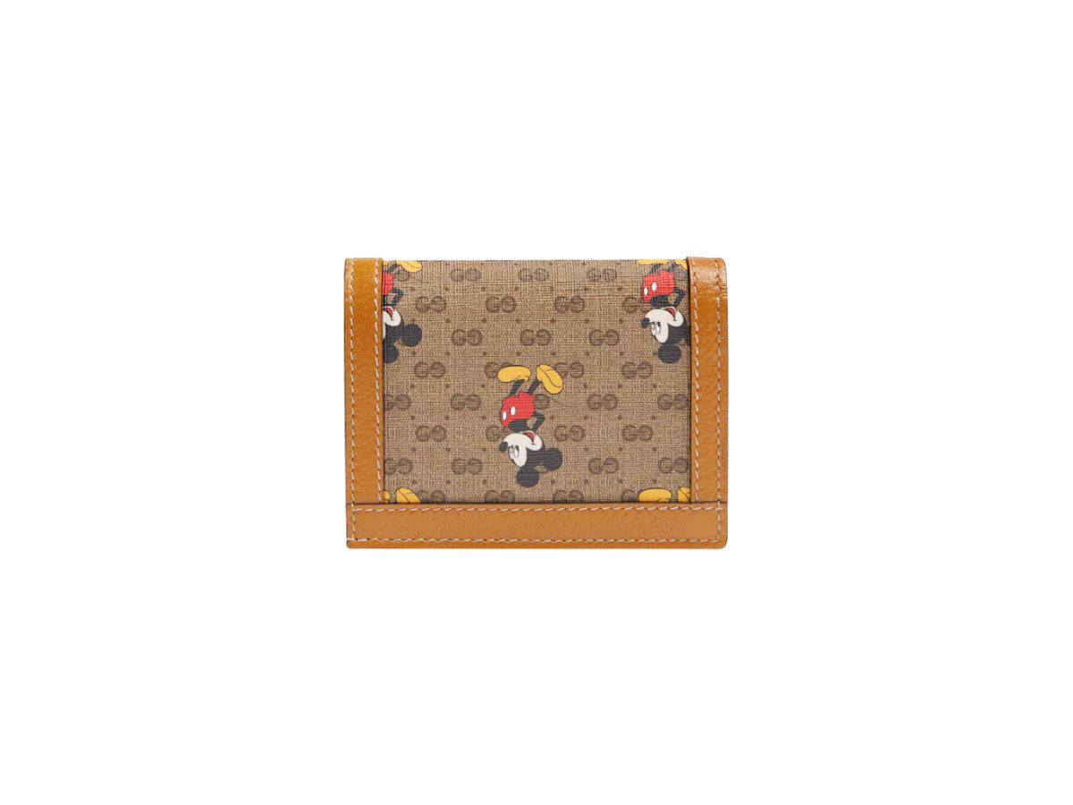 https://d2cva83hdk3bwc.cloudfront.net/gucci-x-disney-card-case-wallet-in-beige-ebony-mini-gg-supreme-canvas-with-mickey-mouse-print-3.jpg
