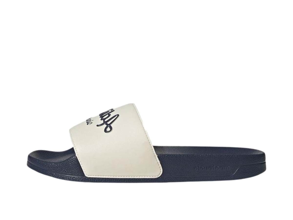 https://d2cva83hdk3bwc.cloudfront.net/gw8748-adidas-adilette-shower-slide-white-shadow-navy-2.jpg