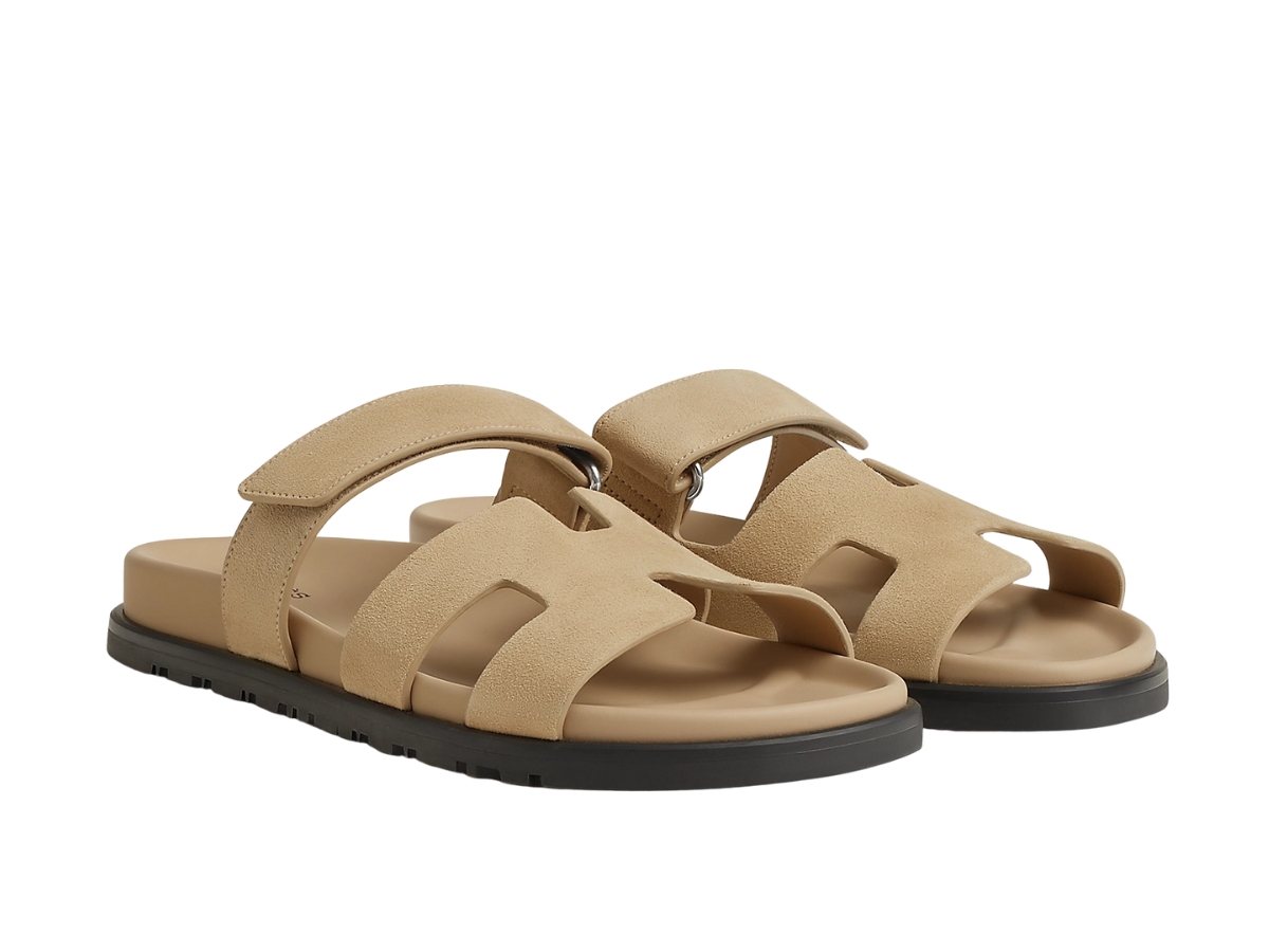 https://d2cva83hdk3bwc.cloudfront.net/h222297z-5k-hermes-chypre-chypre-sandal-beige-lin-with-black-rubber-sole-2.jpg