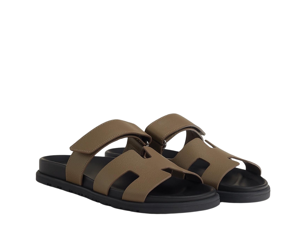 https://d2cva83hdk3bwc.cloudfront.net/h231295z-x3-hermes-chypre-sandal-in-epsom-calfskin-with-anatomical-rubber-sole-and-adjustable-strap-toupe-2.jpg