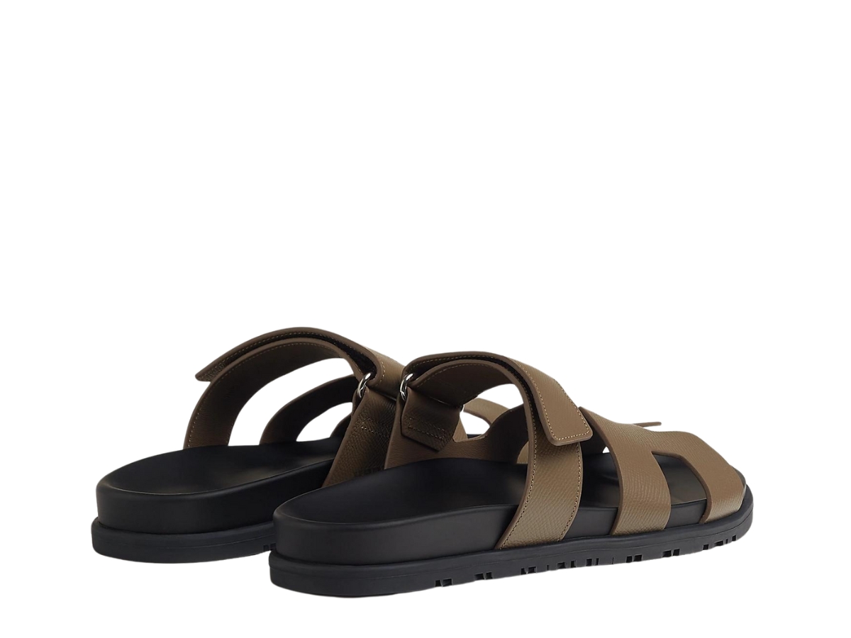 https://d2cva83hdk3bwc.cloudfront.net/h231295z-x3-hermes-chypre-sandal-in-epsom-calfskin-with-anatomical-rubber-sole-and-adjustable-strap-toupe-3.jpg
