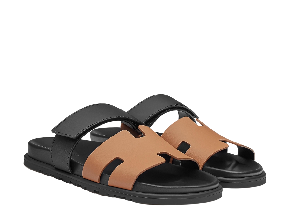 https://d2cva83hdk3bwc.cloudfront.net/hermes-chypre-sandal-in-calfskin-with-anatomical-rubber-sole-and-adjustable-strap-naturel-safari-noir-3.jpg