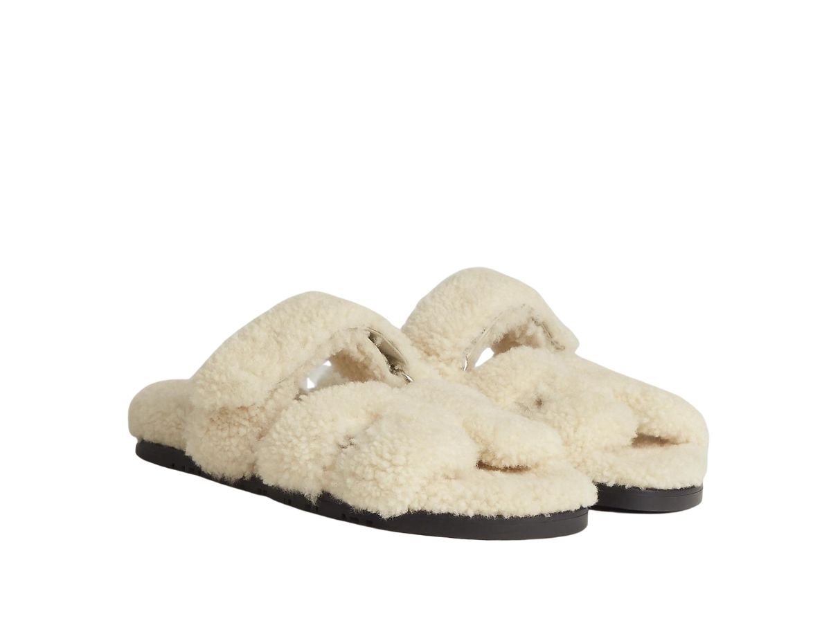 https://d2cva83hdk3bwc.cloudfront.net/hermes-chypre-sandal-in-shearling-with-anatomical-rubber-sole-and-adjustable-strap-ecru-2.jpg