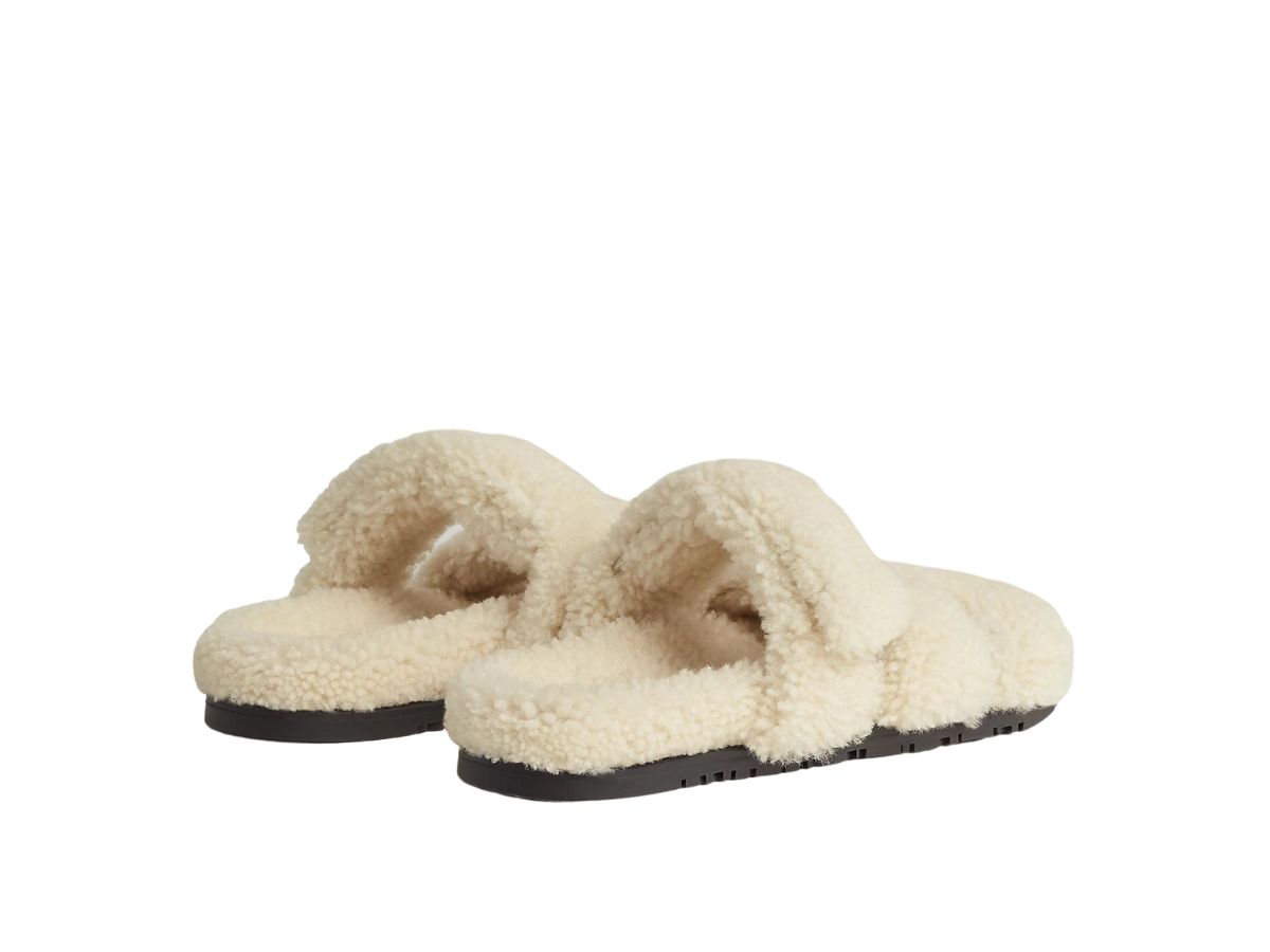 https://d2cva83hdk3bwc.cloudfront.net/hermes-chypre-sandal-in-shearling-with-anatomical-rubber-sole-and-adjustable-strap-ecru-3.jpg