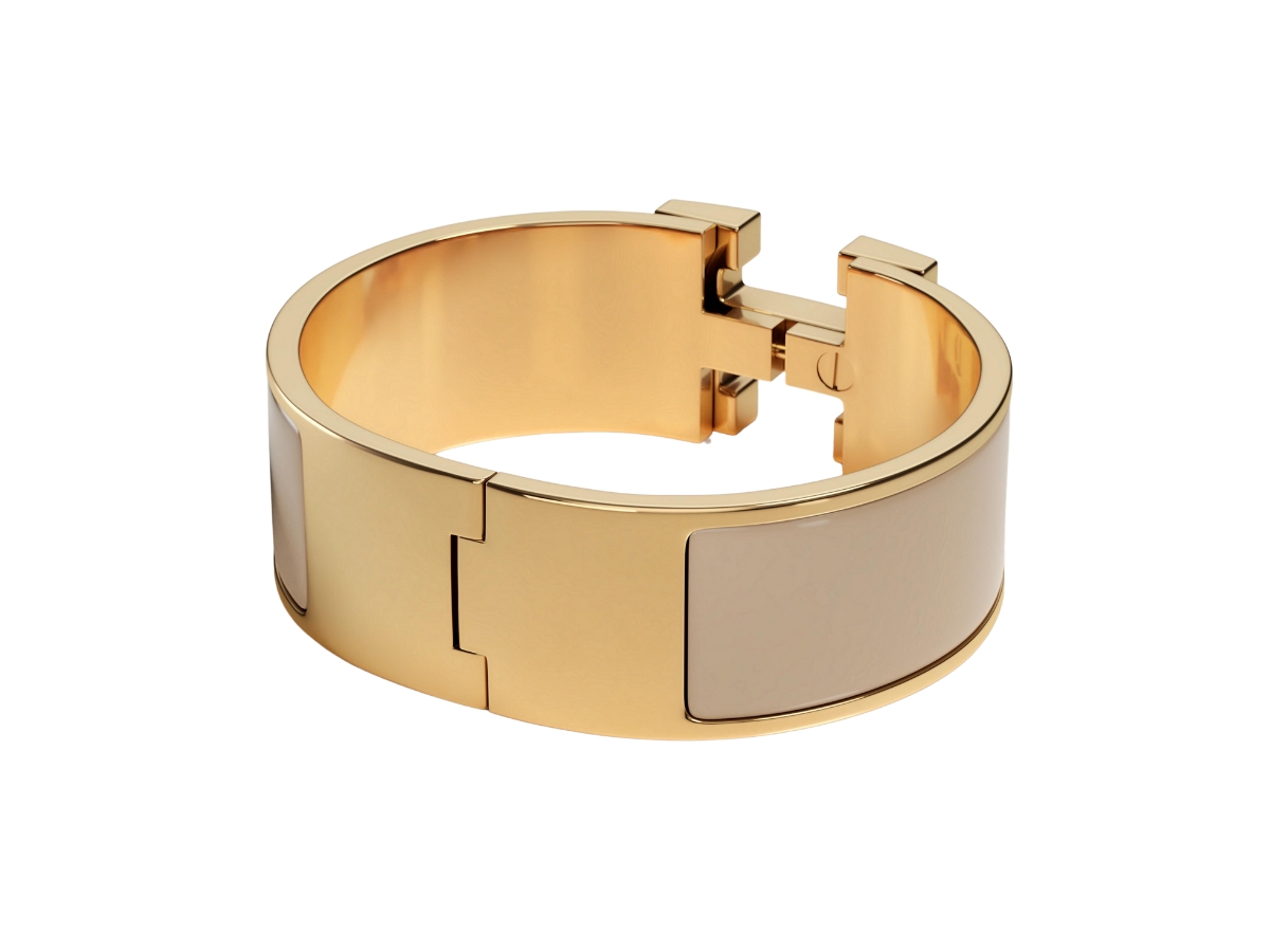 https://d2cva83hdk3bwc.cloudfront.net/hermes-clic-clac-h-bracelet-in-enamel-with-gold-plated-hardware-marron-glace-2.jpg