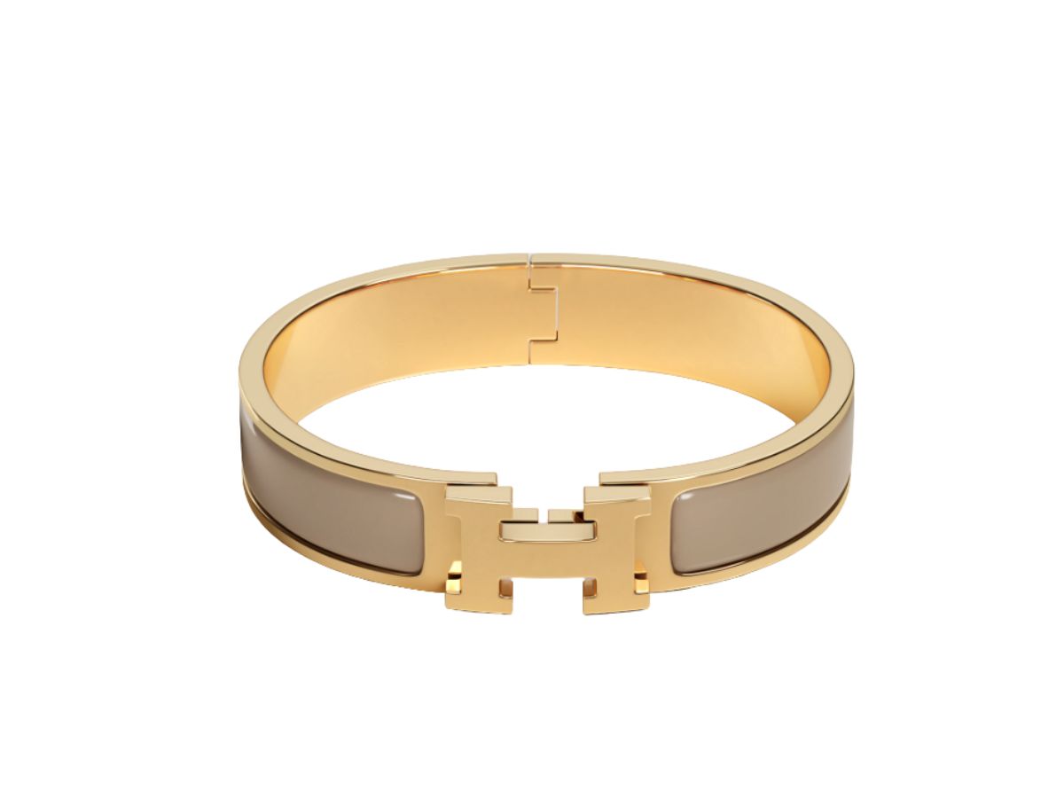 https://d2cva83hdk3bwc.cloudfront.net/hermes-clic-h-bracelet-in-enamel-with-gold-plated-hardware-marron-glace-1.jpg
