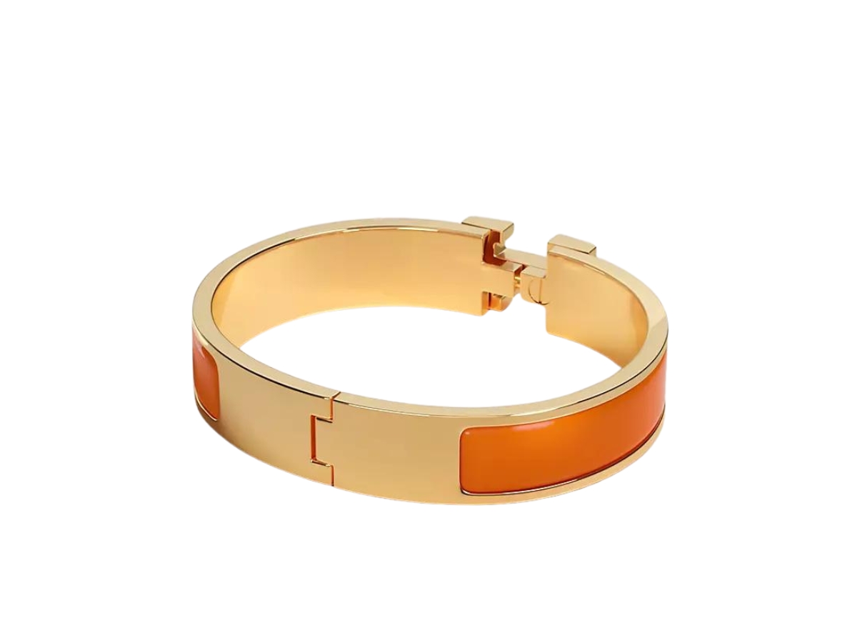 https://d2cva83hdk3bwc.cloudfront.net/hermes-clic-h-bracelet-in-enamel-with-gold-plated-hardware-orange-2.jpg