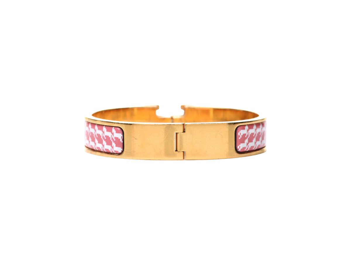 https://d2cva83hdk3bwc.cloudfront.net/hermes-clic-h-cheval-pixel-bracelet-in-cheval-pixel-printed-enamel-with-gold-plated-hardware-terre-orange-2.jpg