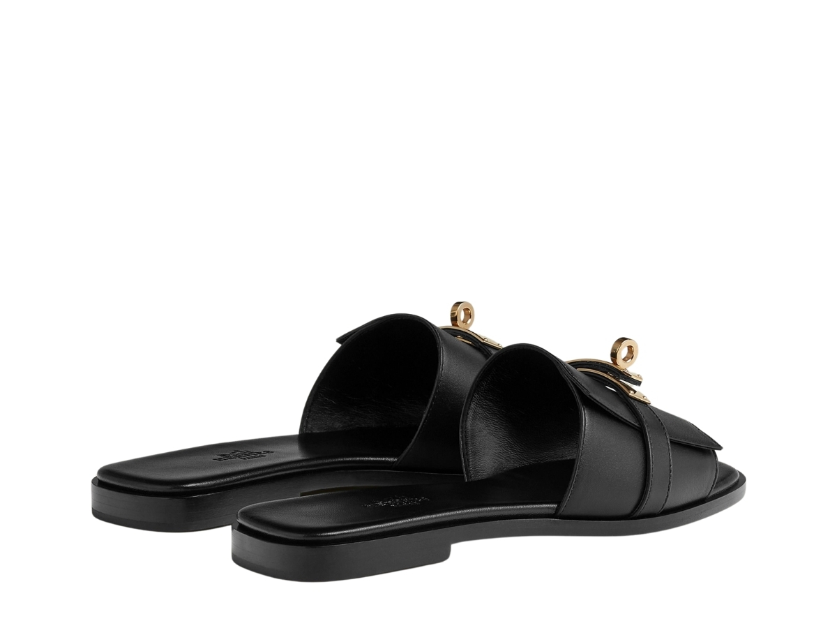 https://d2cva83hdk3bwc.cloudfront.net/hermes-giulia-sandal-in-calfskin-with-iconic-permabrass-plated-kelly-buckle-noir-3.jpg
