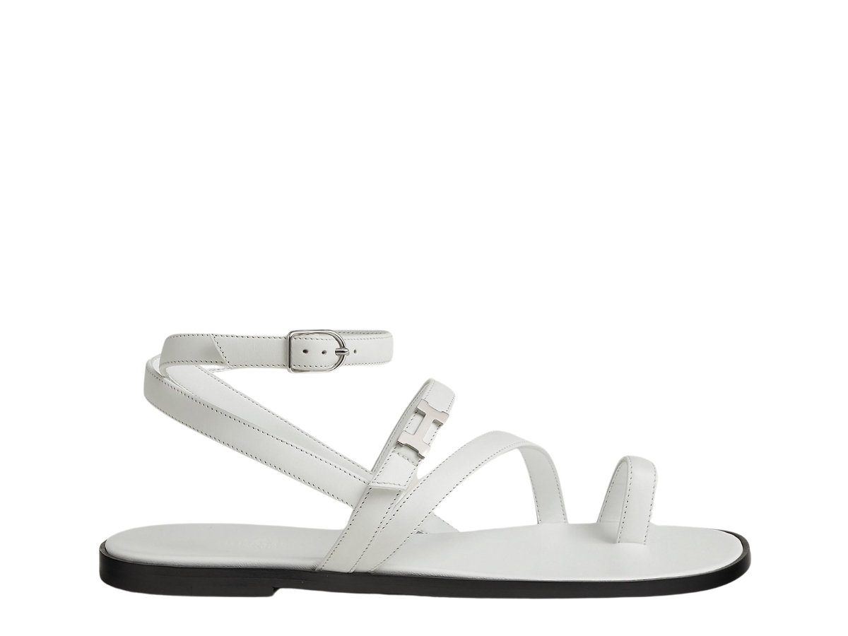 https://d2cva83hdk3bwc.cloudfront.net/hermes-harmonie-sandal-in-calfskin-with-miniature-palladium-plated-paris-buckle-blanc-1.jpg