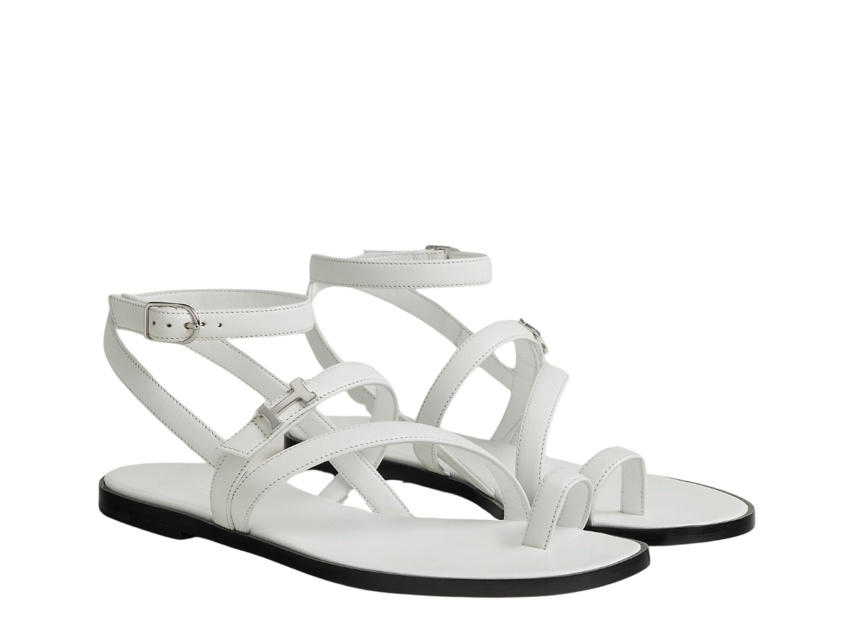 https://d2cva83hdk3bwc.cloudfront.net/hermes-harmonie-sandal-in-calfskin-with-miniature-palladium-plated-paris-buckle-blanc-2.jpg