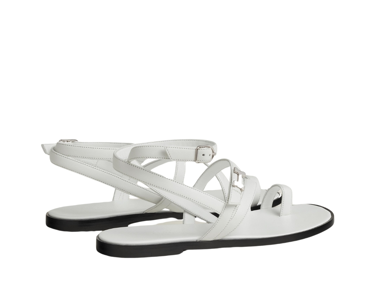 https://d2cva83hdk3bwc.cloudfront.net/hermes-harmonie-sandal-in-calfskin-with-miniature-palladium-plated-paris-buckle-blanc-3.jpg