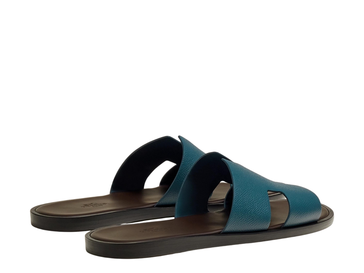 https://d2cva83hdk3bwc.cloudfront.net/hermes-izmir-sandal-in-epsom-calfskin-with-iconic-h-cut-out-bleu-canard-marron-ebene-3.jpg