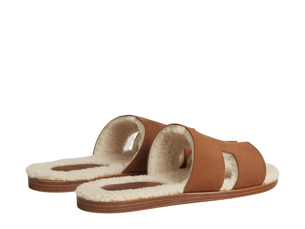 https://d2cva83hdk3bwc.cloudfront.net/hermes-izmir-sandal-in-suede-goatskin-and-woolskin-with-iconic-h-cut-out-marron-teck--cru-3.jpg