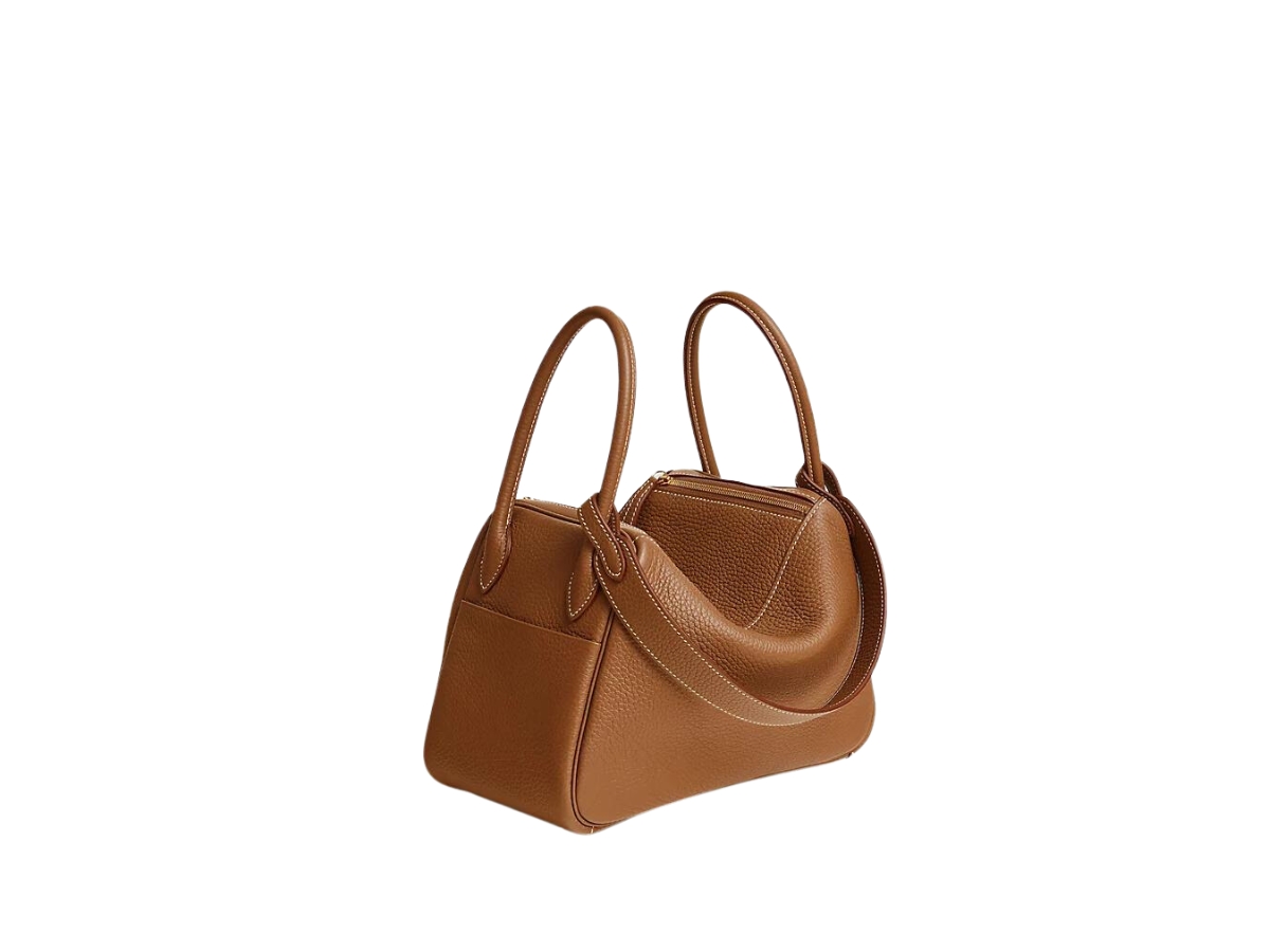 https://d2cva83hdk3bwc.cloudfront.net/hermes-lindy-26-bag-in-taurillon-clemence-leather-with-gold-plated-hardware--gold-brown-2.jpg