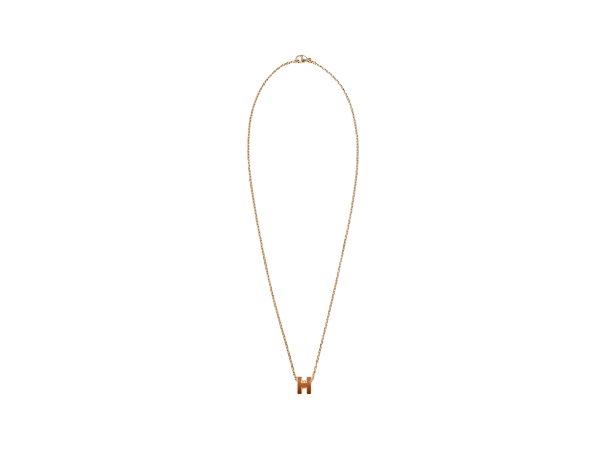 https://d2cva83hdk3bwc.cloudfront.net/hermes-mini-pop-h-pendant-in-lacquered-metal-with-gold-plated-hardware-new-gold-2.jpg