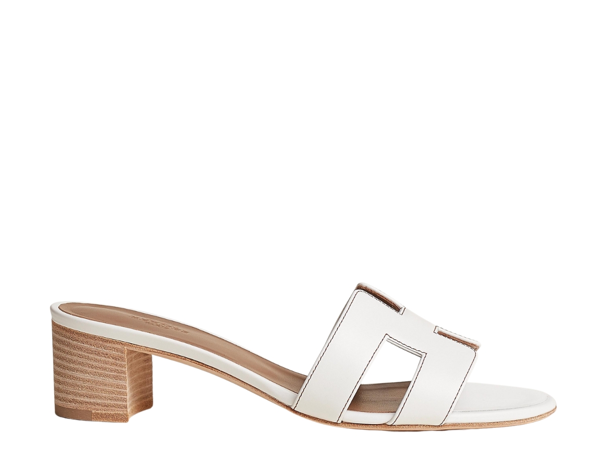 https://d2cva83hdk3bwc.cloudfront.net/hermes-oasis-sandal-in-calfskin-with-iconic-h-cut-out-blanc-1.jpg