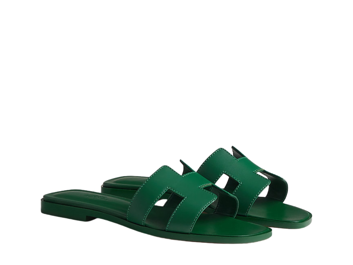 https://d2cva83hdk3bwc.cloudfront.net/hermes-oran-sandal-in-box-calfskin-with-iconic-h-cut-out-vert-lectrique-2.jpg