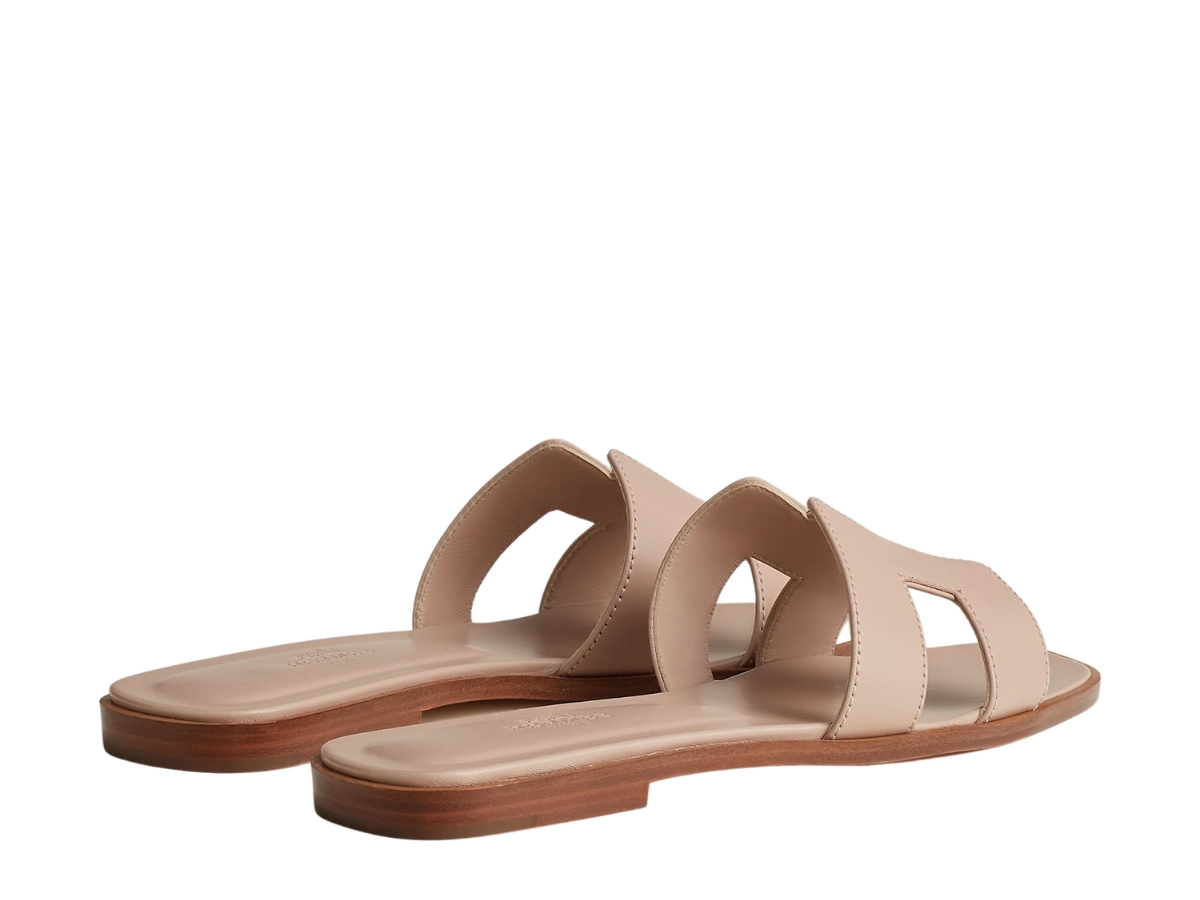 https://d2cva83hdk3bwc.cloudfront.net/hermes-oran-sandal-in-calfskin-with-iconic-h-cut-out-beige-nude-3.jpg
