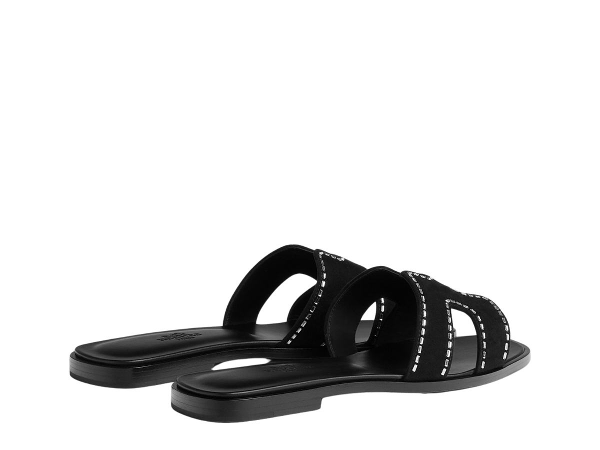 https://d2cva83hdk3bwc.cloudfront.net/hermes-oran-sandal-in-calfskin-with-iconic-h-cut-out-rhinestone-details-noir-3.jpg