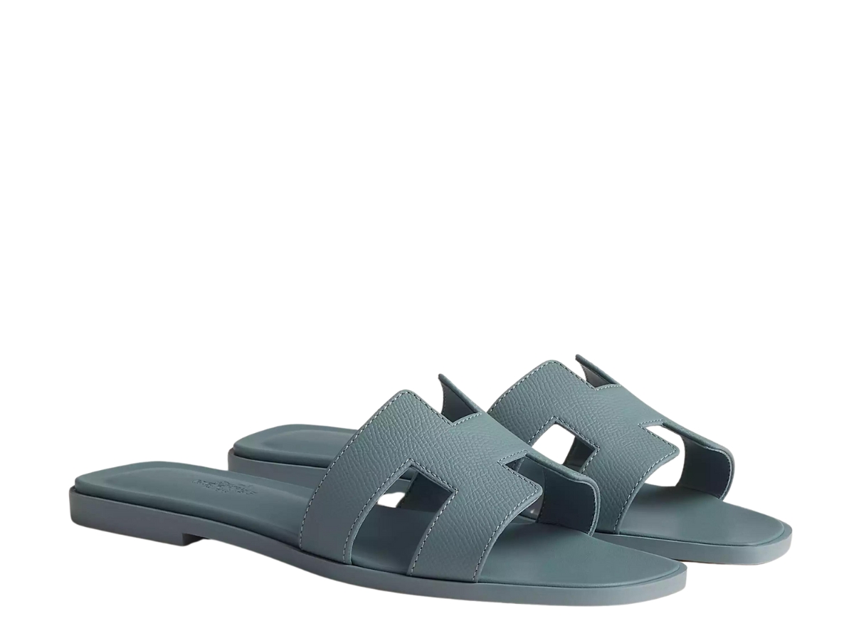 https://d2cva83hdk3bwc.cloudfront.net/hermes-oran-sandal-in-epsom-calfskin-with-iconic-h-cut-out-gris-antarctique-2.jpg