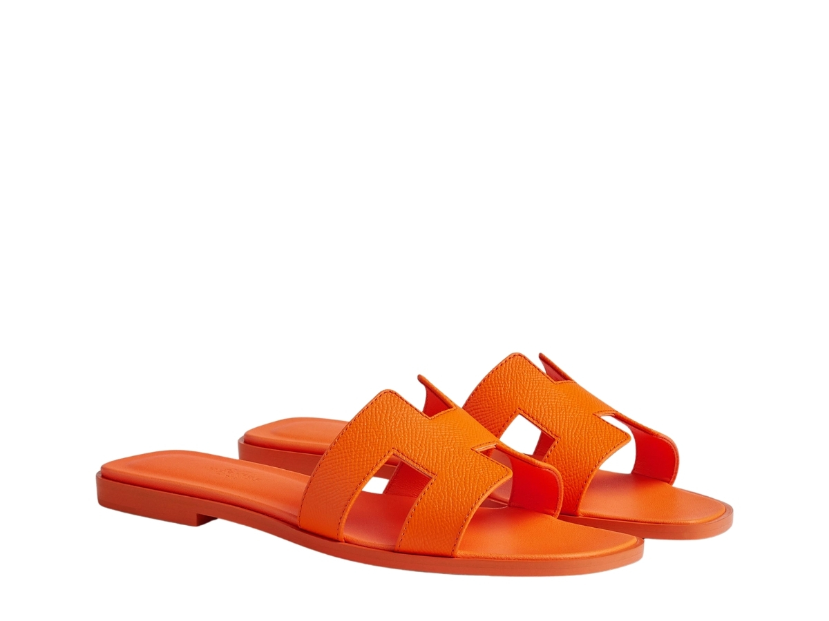 https://d2cva83hdk3bwc.cloudfront.net/hermes-oran-sandal-in-epsom-calfskin-with-iconic-h-cut-out-orange-sunset-2.jpg