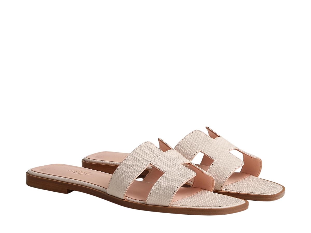 https://d2cva83hdk3bwc.cloudfront.net/hermes-oran-sandal-in-shiny-lizard-leather-with-iconic-h-cut-out-rose-p-le-2.jpg