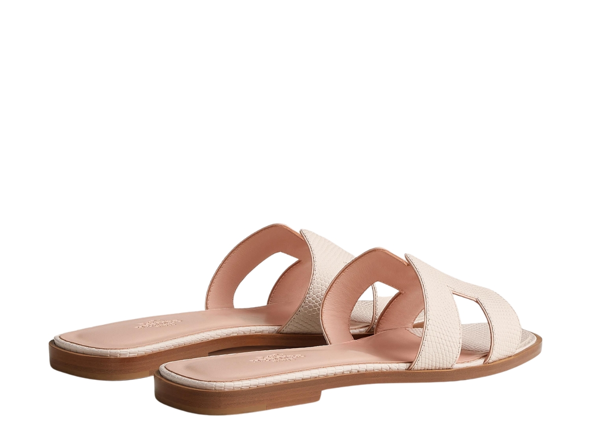 https://d2cva83hdk3bwc.cloudfront.net/hermes-oran-sandal-in-shiny-lizard-leather-with-iconic-h-cut-out-rose-p-le-3.jpg
