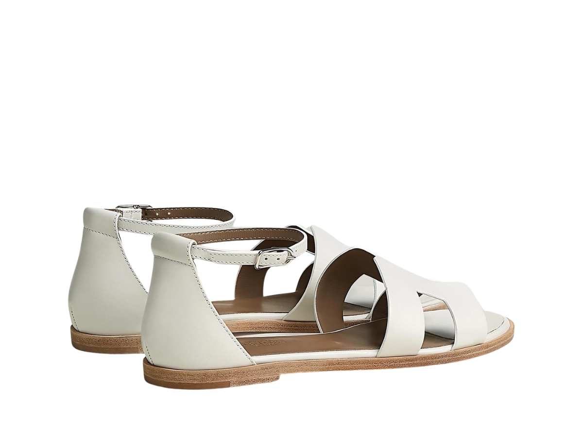 https://d2cva83hdk3bwc.cloudfront.net/hermes-santorini-sandal-in-calfskin-with-straight-cut-edges-h-cut-out-detail-and-thin-ankle-strap-blanc-3.jpg