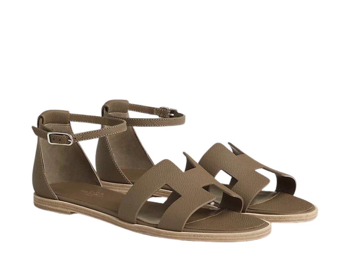 https://d2cva83hdk3bwc.cloudfront.net/hermes-santorini-sandal-in-epsom-calfskin-with-h-cut-out-detail-and-thin-ankle-strap--toupe--w--2.jpg