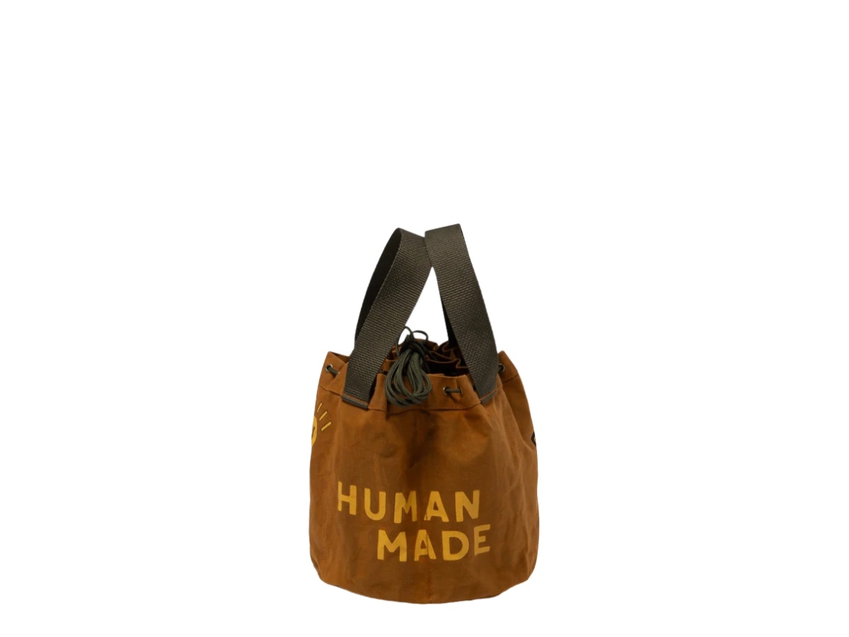 https://d2cva83hdk3bwc.cloudfront.net/hm31gd052-brown-human-made-drawstring-bag-dry-alls-duck-brown-4.jpg