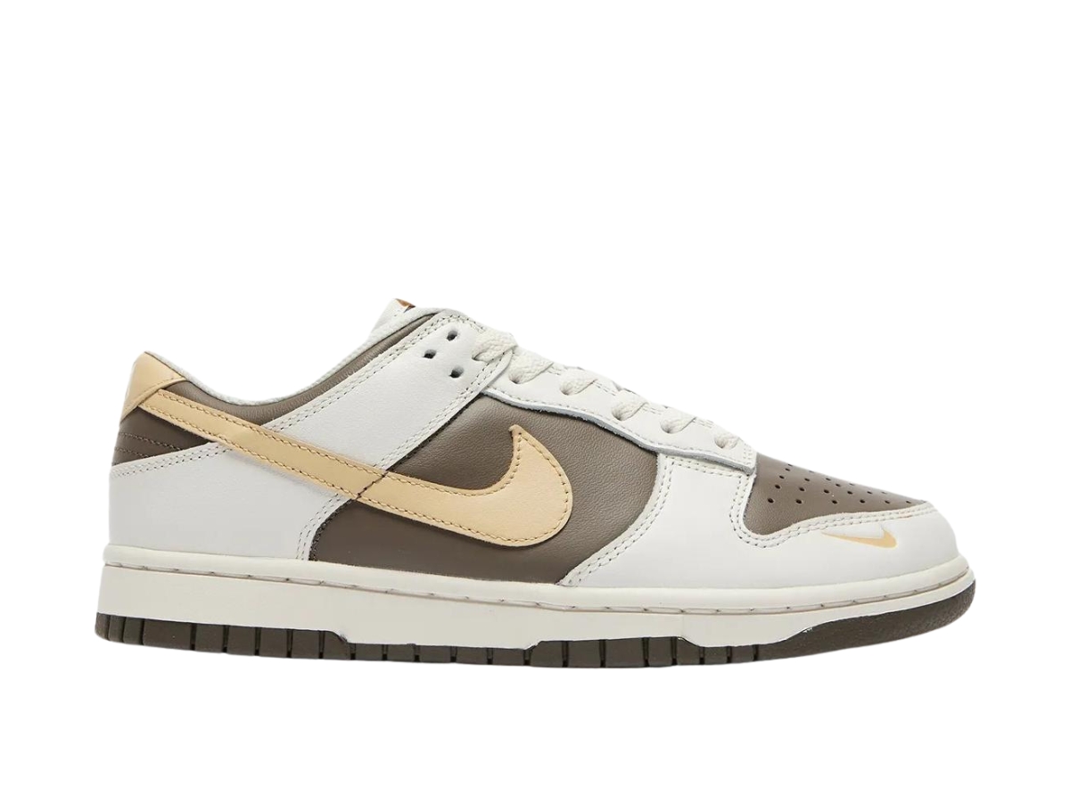 https://d2cva83hdk3bwc.cloudfront.net/hm9655-001-nike-dunk-low-sesame-ironstone-women-s-1.jpg