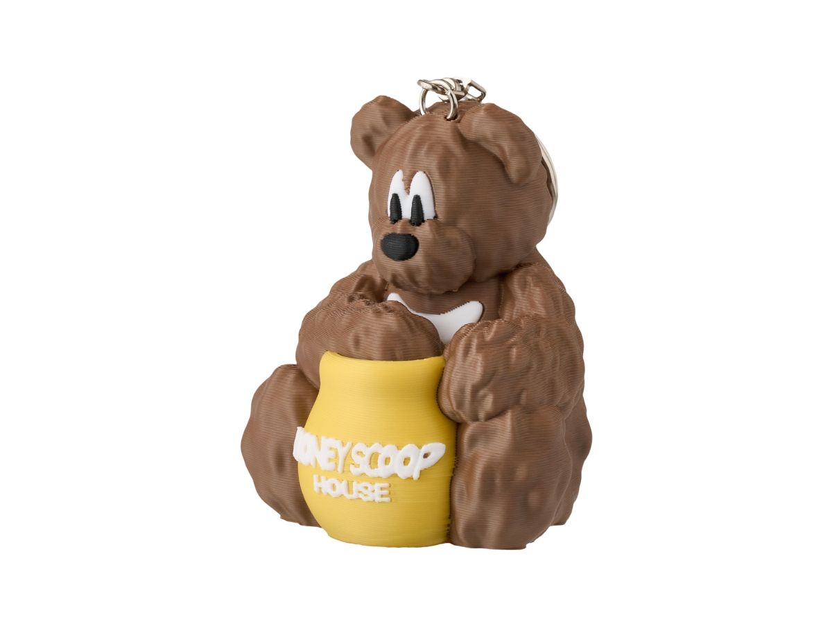https://d2cva83hdk3bwc.cloudfront.net/honey-scoop-house-honey-bear-manfromeast-keychain-brown-2.jpg