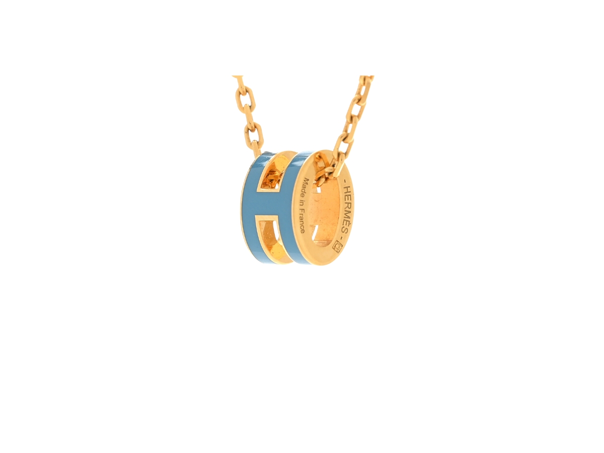 https://d2cva83hdk3bwc.cloudfront.net/hrm-nlahlgmphpnbj-hermes-lacquered-gold-mini-pop-h-pendant-necklace-bleu-jean-2.jpg