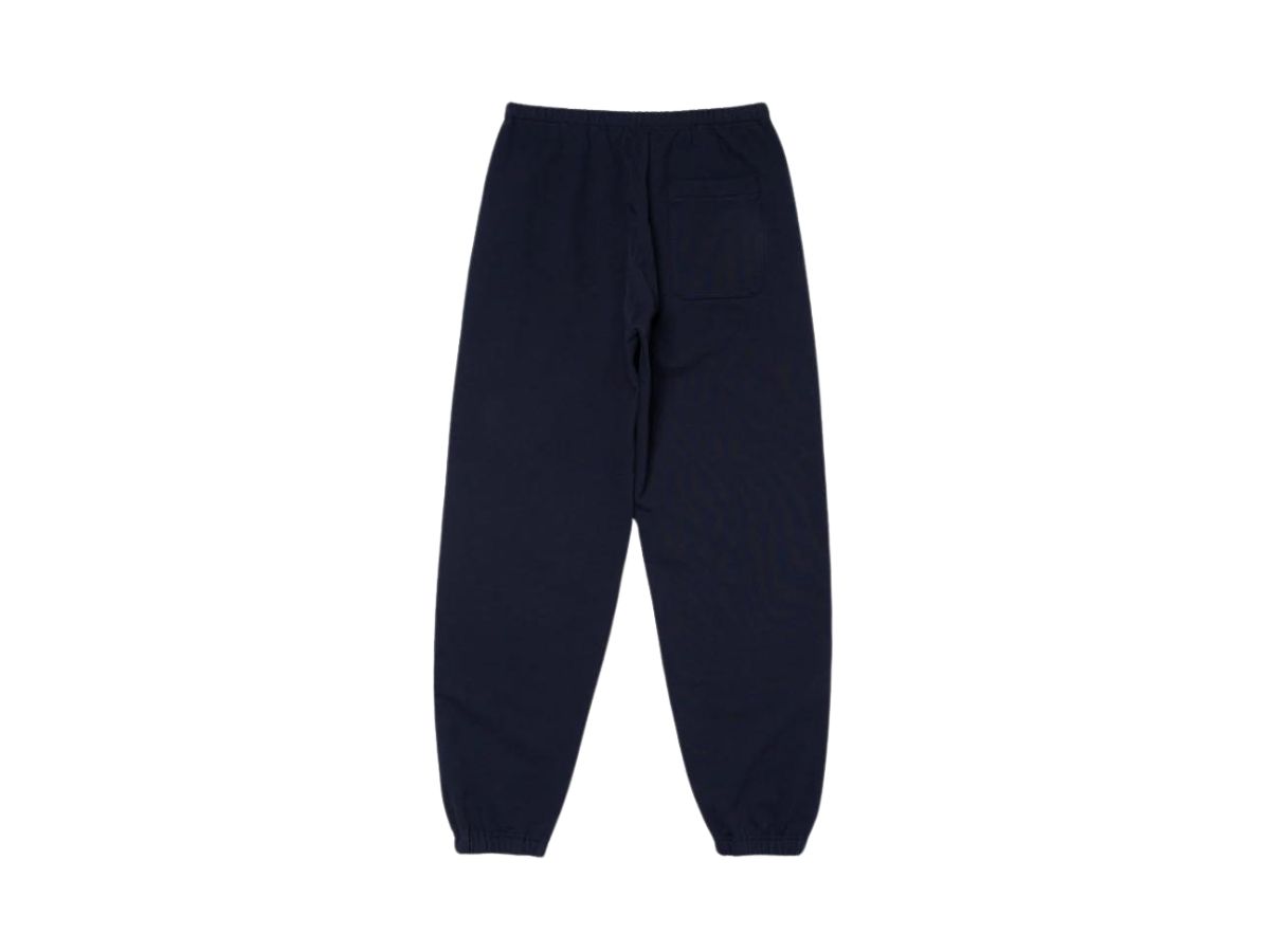 https://d2cva83hdk3bwc.cloudfront.net/human-made-sweatpants-with-a-distinctive-crack-print-navy-2.jpg
